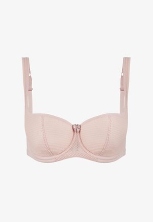 Light pink textured underwire bra with adjustable shoulder straps and a small decorative bow at the center front.
