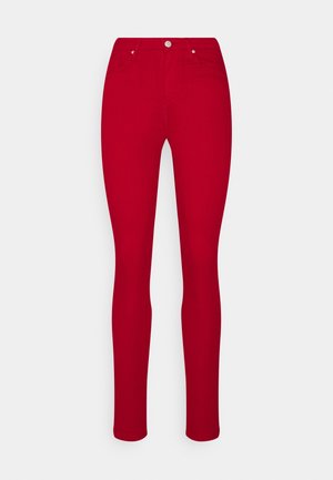 Vaqueros pitillo - red