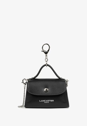 Black Lancaster Paris mini handbag keychain with flap, silver snap button, top handle, and chain attachment clip.