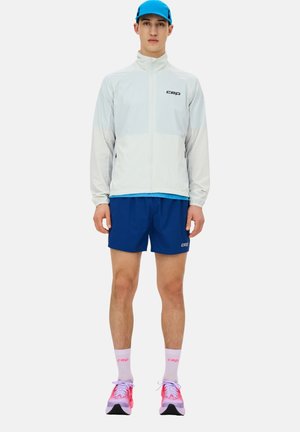 CEP RUN WINDBREAKER - Training jacket - ice
