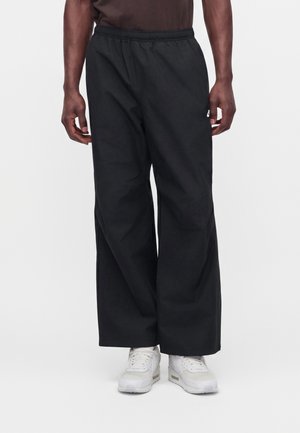 Nike Sportswear, Панталони - black/white
