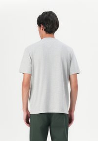 Tommy Hilfiger - T-shirt z nadrukiem