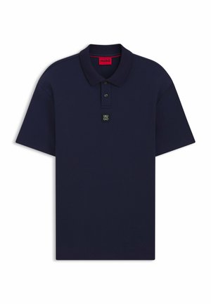 Navy blue polo shirt with short sleeves, a flat collar, and a black logo on the chest. Features two buttons at the neckline.