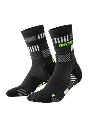 COMPRESSION MID CUT THE RUN LIMITED - Sports socks - black neon yellow