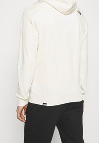 The North Face Jersey con capucha - white