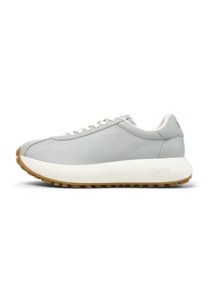 Gray leather sneaker with a white sole, featuring a rounded toe, padded collar, and textured rubber outsole. Laces are white.