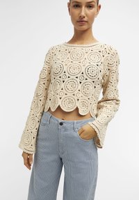 Object BESTICKTES - Trui - sandshell