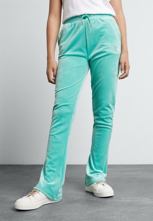 DIAMANTE BOOTCUT - Tracksuit bottoms - turquoise