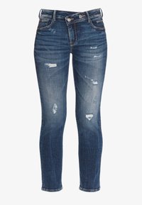 Jean skinny en denim bleu foncé avec une finition délavée. Présente des détails en détresse et un design classique à cinq poches avec fermeture à deux boutons.