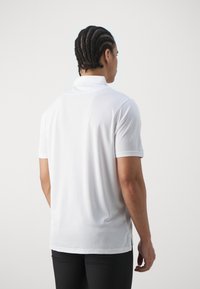 Oakley ICON PROTECT  - Pólóing - white
