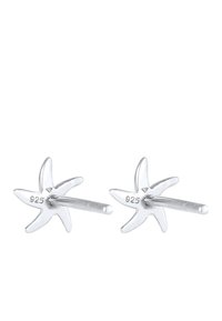 Ohrringe in Form von Sternenbissen aus Sterlingsilber, mit einer polierten Oberfläche, fünfzackigem Design und dem Stempel '925' auf der Rückseite für die Authentizität.