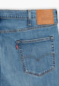 Levi's® Plus Jeans Tapered Fit - blue denim