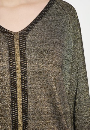 Schwarzes und goldenes, strukturiertes Strickoberteil mit V-Ausschnitt und vertikalen Streifen im metallischen Finish. Glattes Material mit dezentem Schimmer.