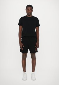 Les Benjamins Παντελόνι φόρμας - black