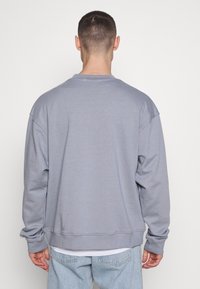 Mennace Sweatshirt - light blue