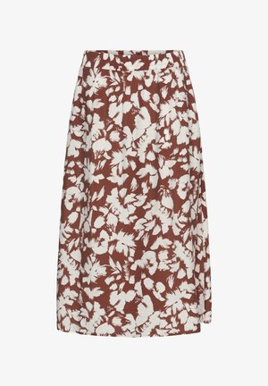 Jupe marron longueur genou avec imprimé floral abstrait blanc et taille ajustée.