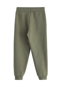 Grågrønne bomulds-joggers med elastisk talje, tapered ankler og en glat tekstur. Ingen synlige mønstre eller yderligere detaljer.