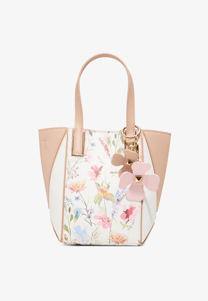 Kwiatowa torba na ramię w białym i beżowym kolorze, z zawieszką w kształcie kwiatu. Gładki materiał zewnętrzny, usztywniony kształt oraz podwójny uchwyt.