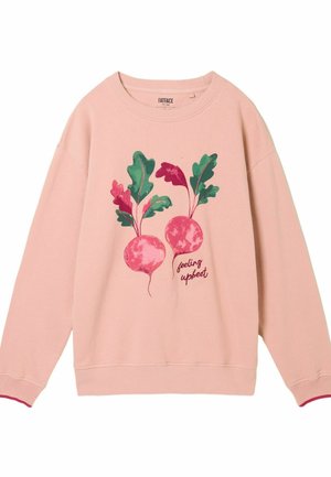 Pink sweatshirt featuring a graphic of two radishes and green leaves. Text below reads "feeling upbeat." Cotton material with ribbed cuffs.