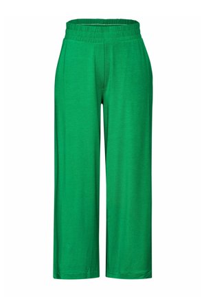 Pantalones verdes, suaves y elásticos con una cinturilla ancha de goma y un ajuste holgado. La tela tiene una textura suave, adecuada para el uso casual.