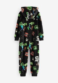 Tuta in pile nera con cappuccio, caratterizzata da personaggi pixelati colorati, casse TNT e varie posizioni d'azione. Maniche e caviglie a coste.