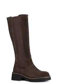 Bottes hautes marron en daim et en tissu élastique. Dotées d'une semelle extérieure noire robuste et d'un surlignement contrastant. Design à bout arrondi.