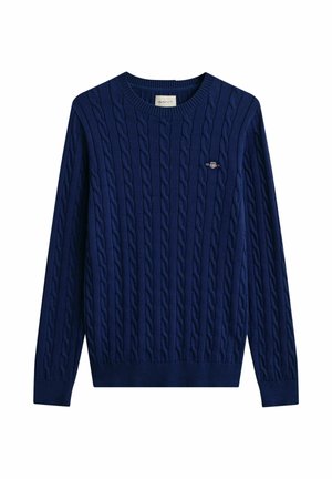 Suéter azul marino de punto con cuello redondo, mangas largas y un pequeño logo bordado en el pecho.