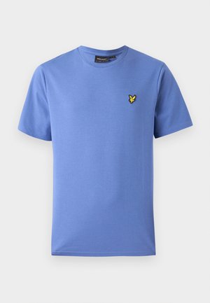 Blå bomulds t-shirt med rund halsudskæring, korte ærmer og et lille gult broderet logo på venstre bryst. Blød tekstur og tætsiddende pasform.