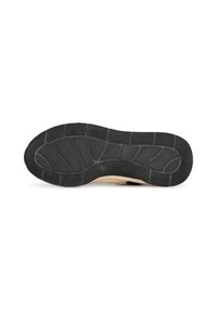 Schuhsohle mit einer strukturierten schwarzen Gummioberfläche, die geometrische Muster und einen leicht erhöhten Rand aufweist. Hellbeige Material ist an der Oberseite sichtbar.