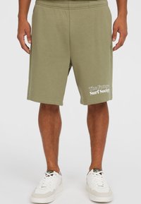 Khaki katoenen shorts met zijzakken, voorzien van een witte logo-opdruk met de tekst "The Future Surf Society" op het linkerpijp.