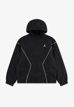Black hooded windbreaker jacket with white piping details, front zipper, zippered pockets, elastic cuffs, and a small white Jumpman logo on the chest.