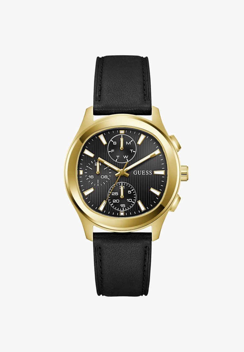 Ανδρικό ρολόι χειρός Guess σε χρυσό τόνο με μαύρο καντράν, μαύρο δερμάτινο λουράκι, τρεις υποκαντράν για ημέρα, 24ωρη ένδειξη και δευτερόλεπτα, καθώς και φωτεινά δείκτες.