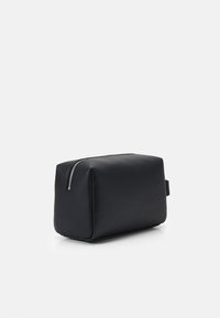 Calvin Klein Jeans SCULPTED BEAUTY CASE MONO UNISEX - Toaletna torbica - black