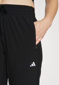 adidas Performance FAST PANT - Träningsbyxor - black