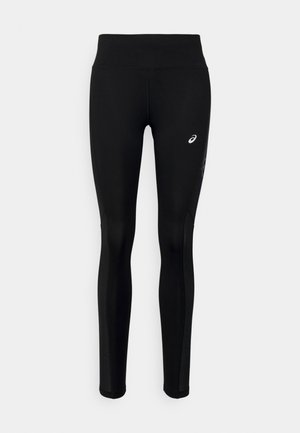 Black athletic leggings featuring a high waistband, smooth texture, and reflective accents on the side for visibility. Logo on front.