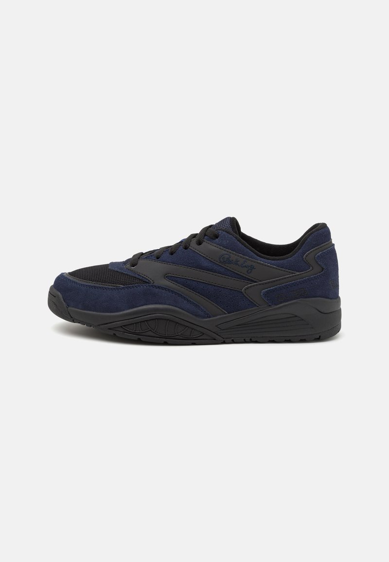 Navy blue athletic shoes made of suede and mesh, featuring black accents, lace closure, and a textured rubber sole with defined tread.