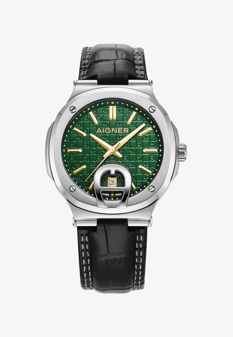 Grøn mønstret urskive med guldfarvede visere og markører, rustfrit stål hus, sort læderrem og datovindue klokken 6.
