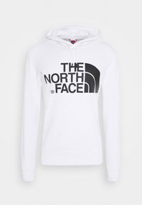 Felpa bianca con cappuccio, dotata di tasca frontale e grande logo nero "The North Face" stampato sul petto.