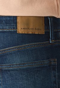 American Eagle ATHLETIC  - Ļoti pieguloši džinsi - dark indigo