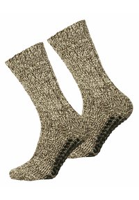 Calze lavorate a maglia con un motivo spesso in marrone e crema, con una parte superiore a costine e una suola nera solida per una maggiore aderenza.