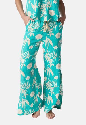 Turquoise wide-leg pants made of textured fabric, featuring a floral pattern in cream. Includes an elastic waistband with a drawstring.