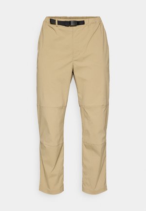 Beige outdoor pants with a black adjustable belt, tapering legs, and a smooth texture. Feature stitched seam details on the knees.