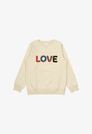 Krämfärgad sweatshirt med färgglada, fluffiga bokstäver som stavar "KÄRLEK" i rött, blått, brunt och grönt. Ribbad ärm- och nederkant. Avslappnad design.