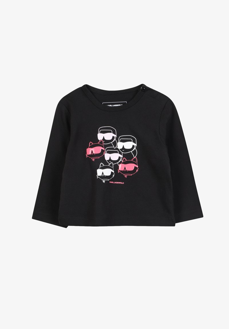 T-shirt noir à manches longues en coton, présentant un graphique de personnages portant des lunettes de soleil en blanc et rose. Comprend un détail de boutons-pression à l'épaule.