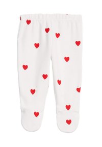 Weiße, gerippte Leggings mit roten Herzmustern, die durchgehend sind, mit Fußdesign und elastischem Bund.