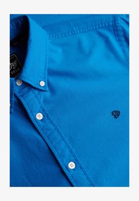 Niet geselecteerd, french blue