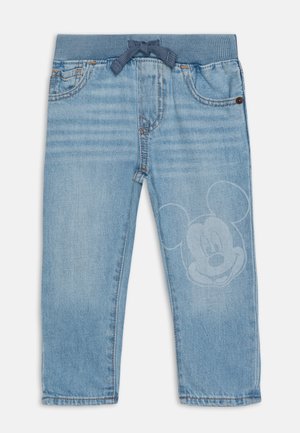 Pantalon en denim bleu clair avec une taille élastique bleu foncé. Présente un graphique léger de Mickey Mouse à l'avant et des poches standard.