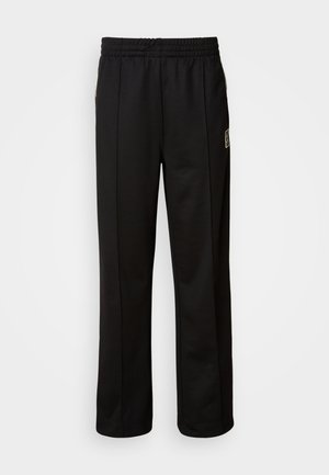 Calvin Klein STRIPE - Treniņtērpa apakšdaļas - black