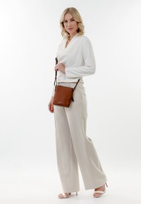Tamaris - ALESSIA - Cross body bag - cognac Thumbnail Image 1