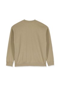 Sweatshirt beige à manches longues, col rond et poignets côtelés. Texture lisse, couleur unie et design minimaliste.